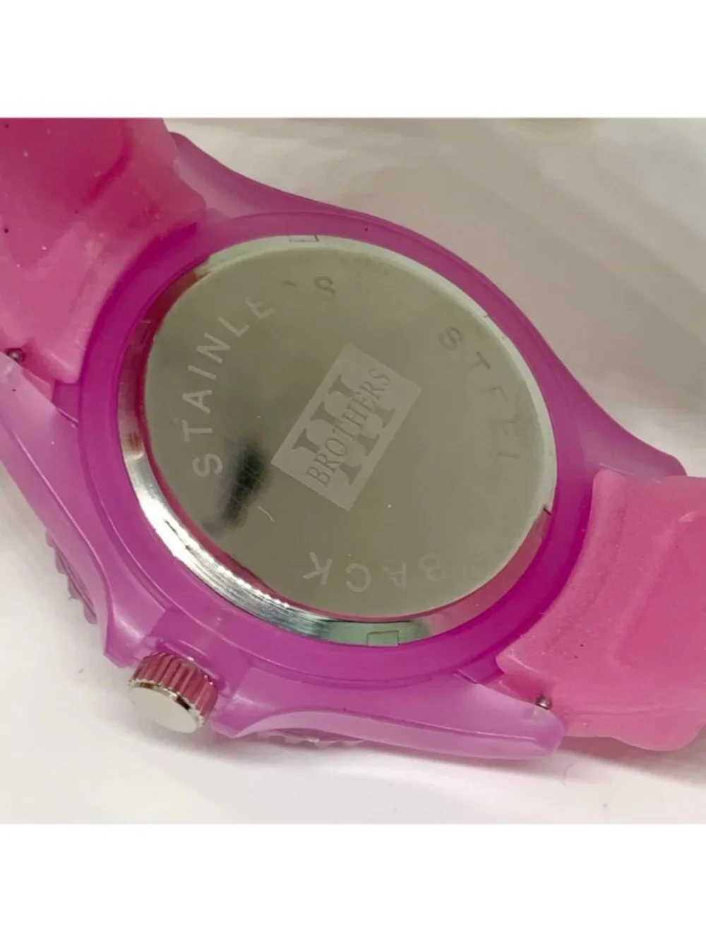 Brothers Quartz analog watch 43mm rotating bezel ,pink silicone band running
